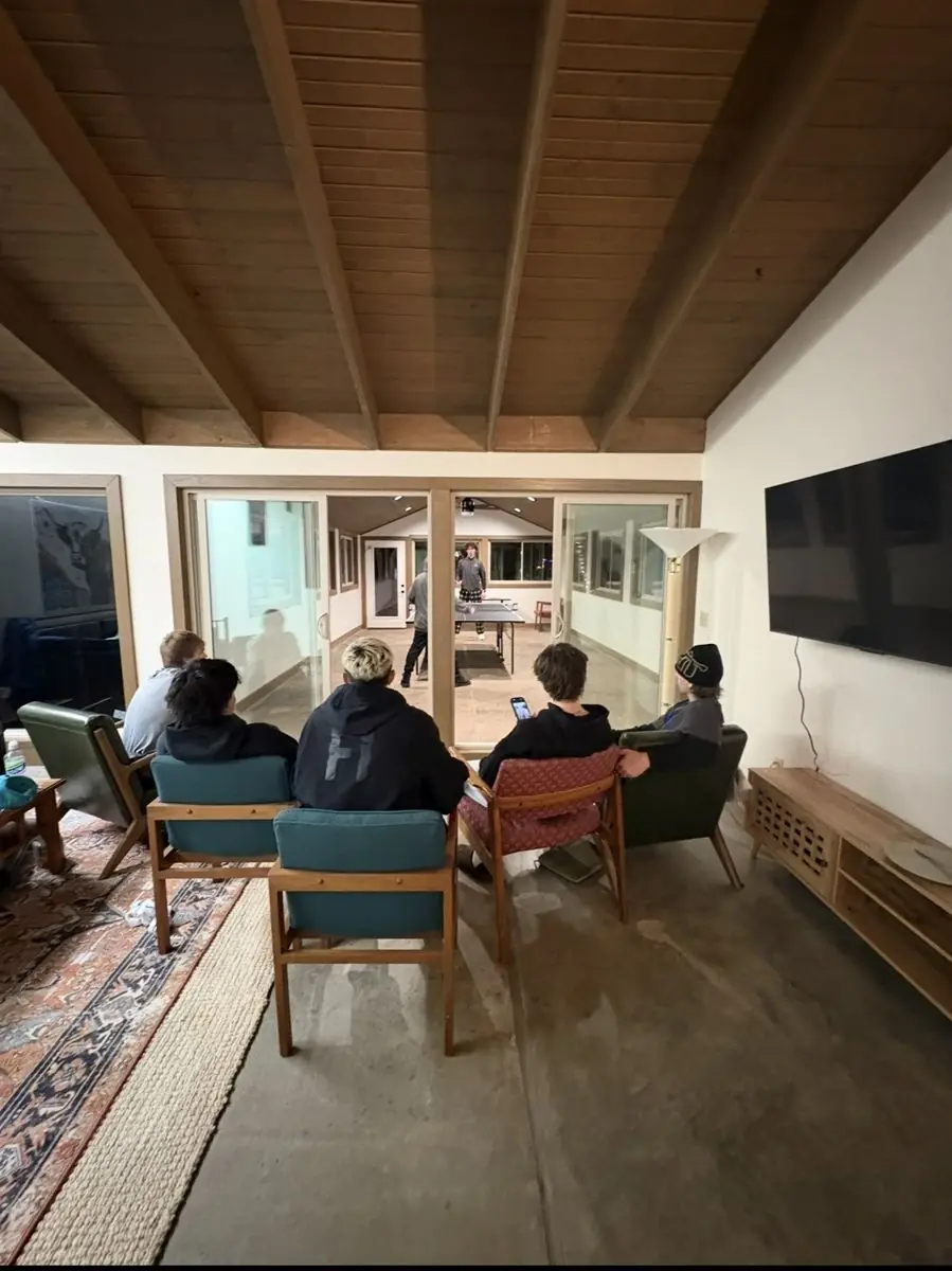 The team hanging out at the team house